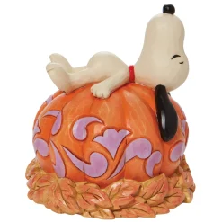 Peanuts by Jim Shore Snoopy Laying Ontop Of Carved